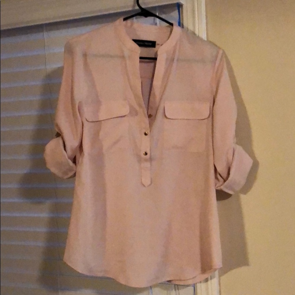 Long sleeved, light pink button up blouse
